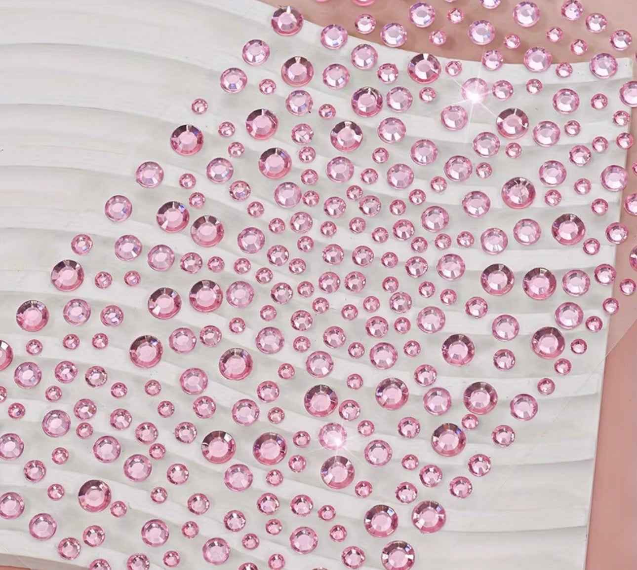 pink rhinestone stickers. Looks dazzling on your face.