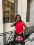 Women’s elegant rouge top with knot.