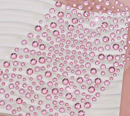 pink rhinestone stickers. Looks dazzling on your face.