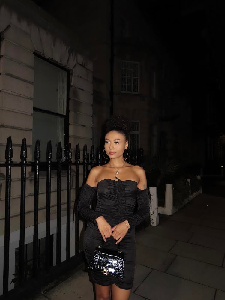 Black Dress In A Satin Ruched Bodycon Style