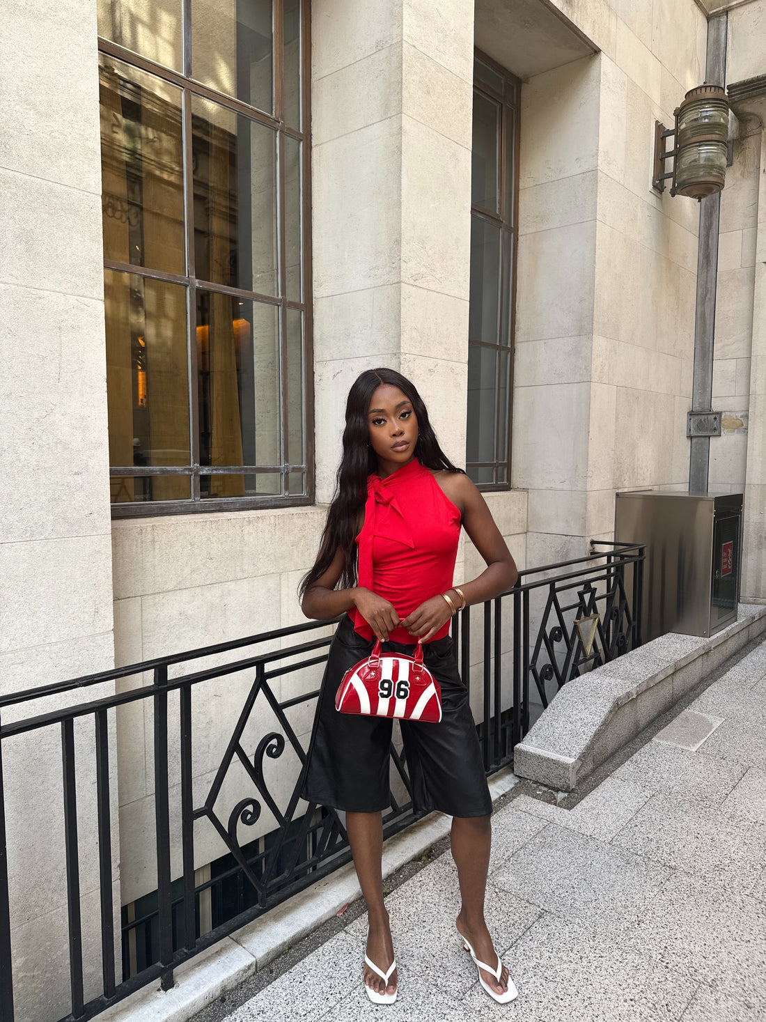 Women’s elegant rouge top with knot.